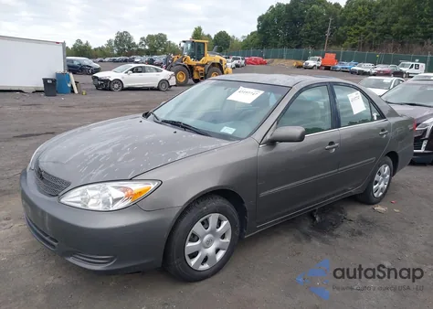 2002 Toyota Camry Le from USA, damaged, VIN 4T1BE32K42U515374